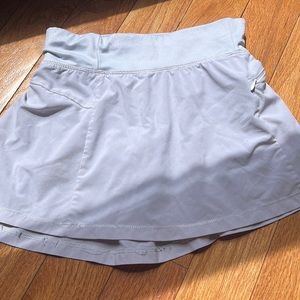 White all in motion tight fit flowy comfortable tennis skirt